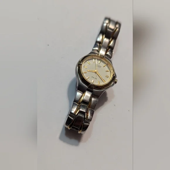 Citizen Wristwatch Silver & Gold Tone Stainless Steel Band Wr 100